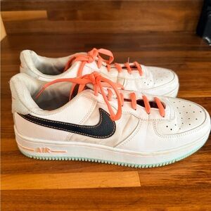 NIKE Air Force One.  White Sneakers with Black,Orange Laces and tongue.